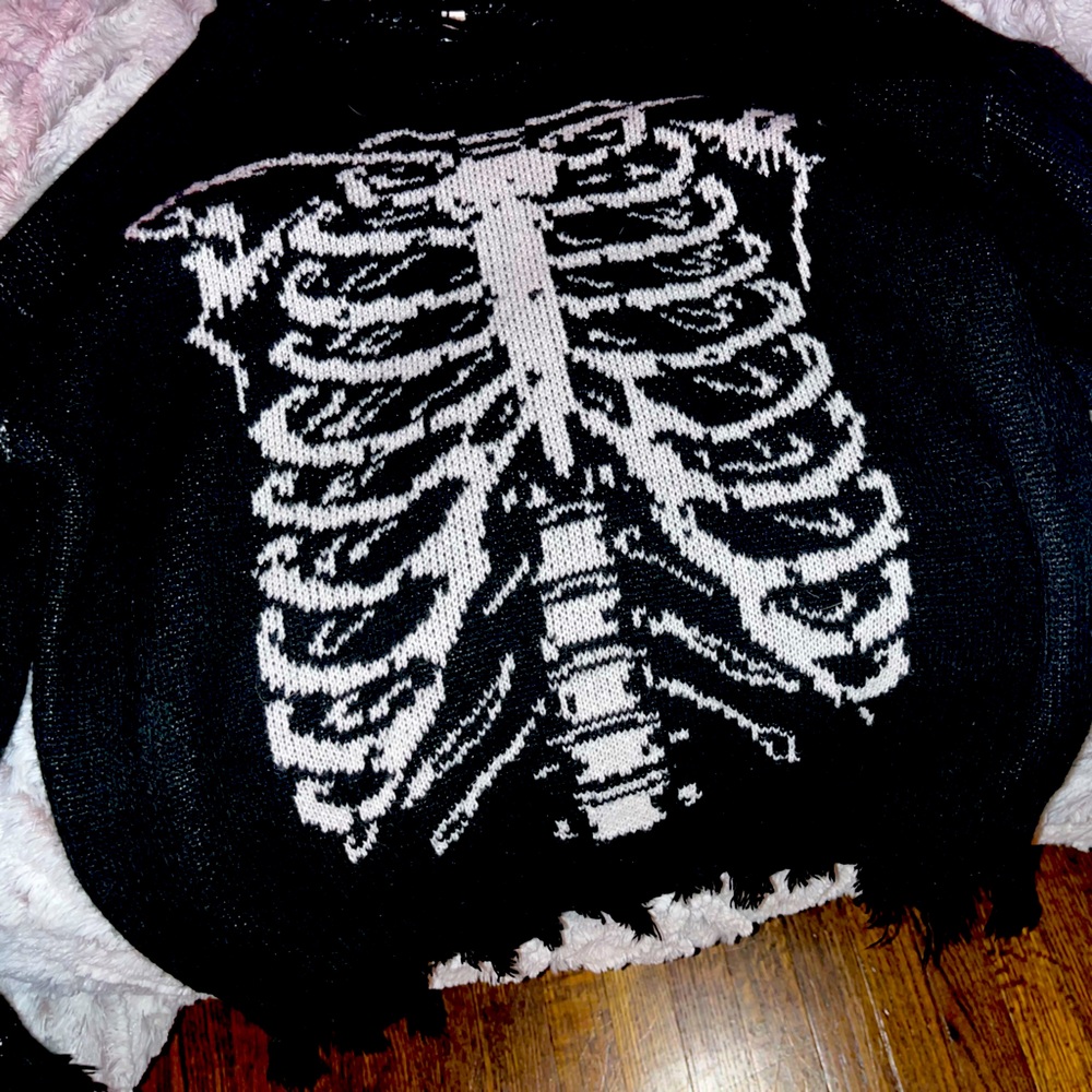yk skeleton 🩻 sweater with rips